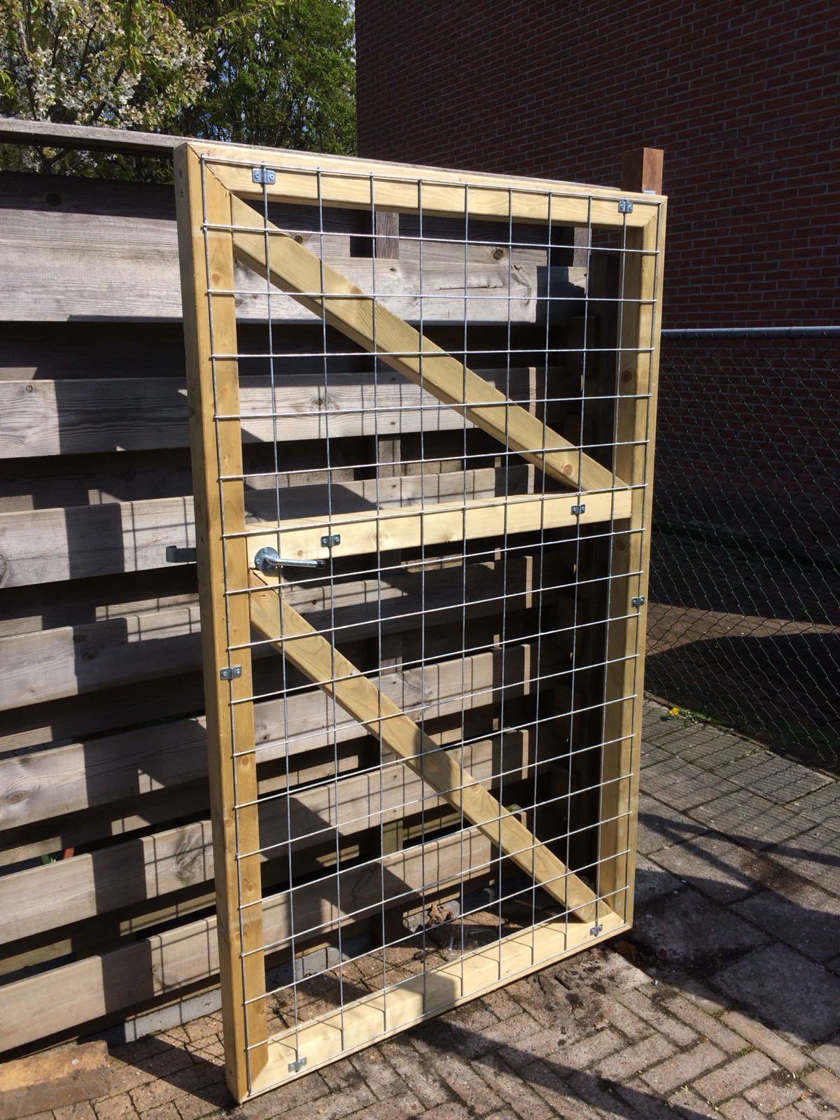 Tuinschutting gaas3 Laminaatleggen